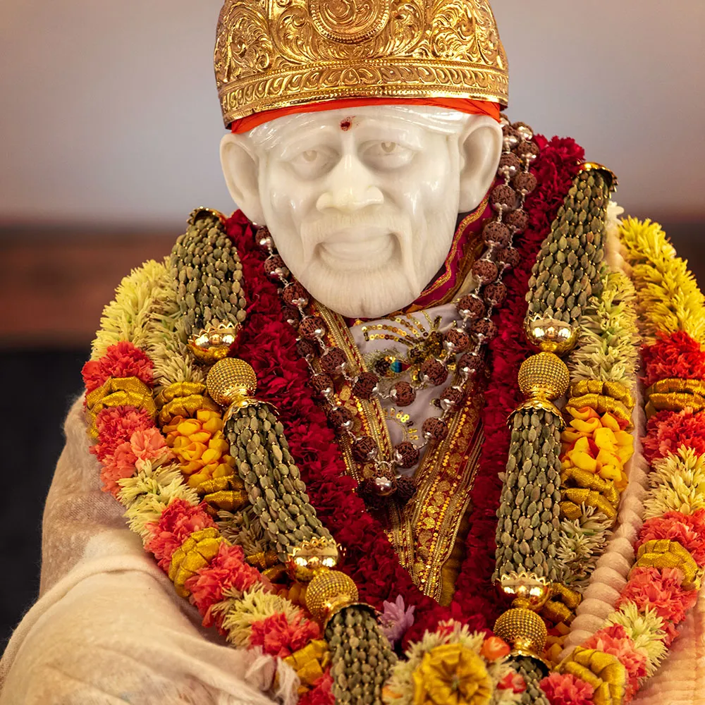 A white marble statue, or murthi, of Shirdi Sai Baba at Skanda Vale