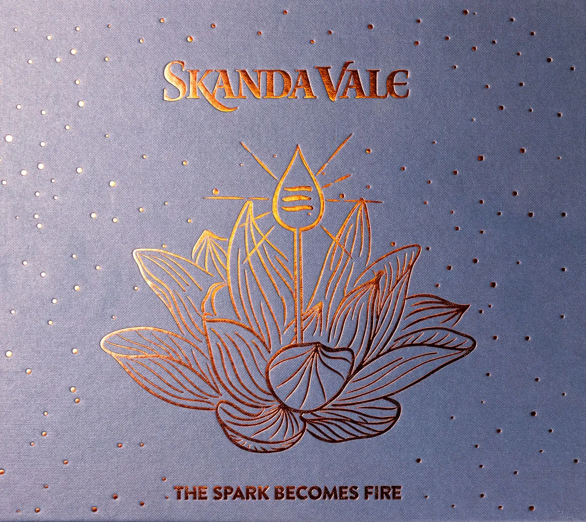 Front cover of the Skanda Vale book 'The Spark Becomes Fire'
